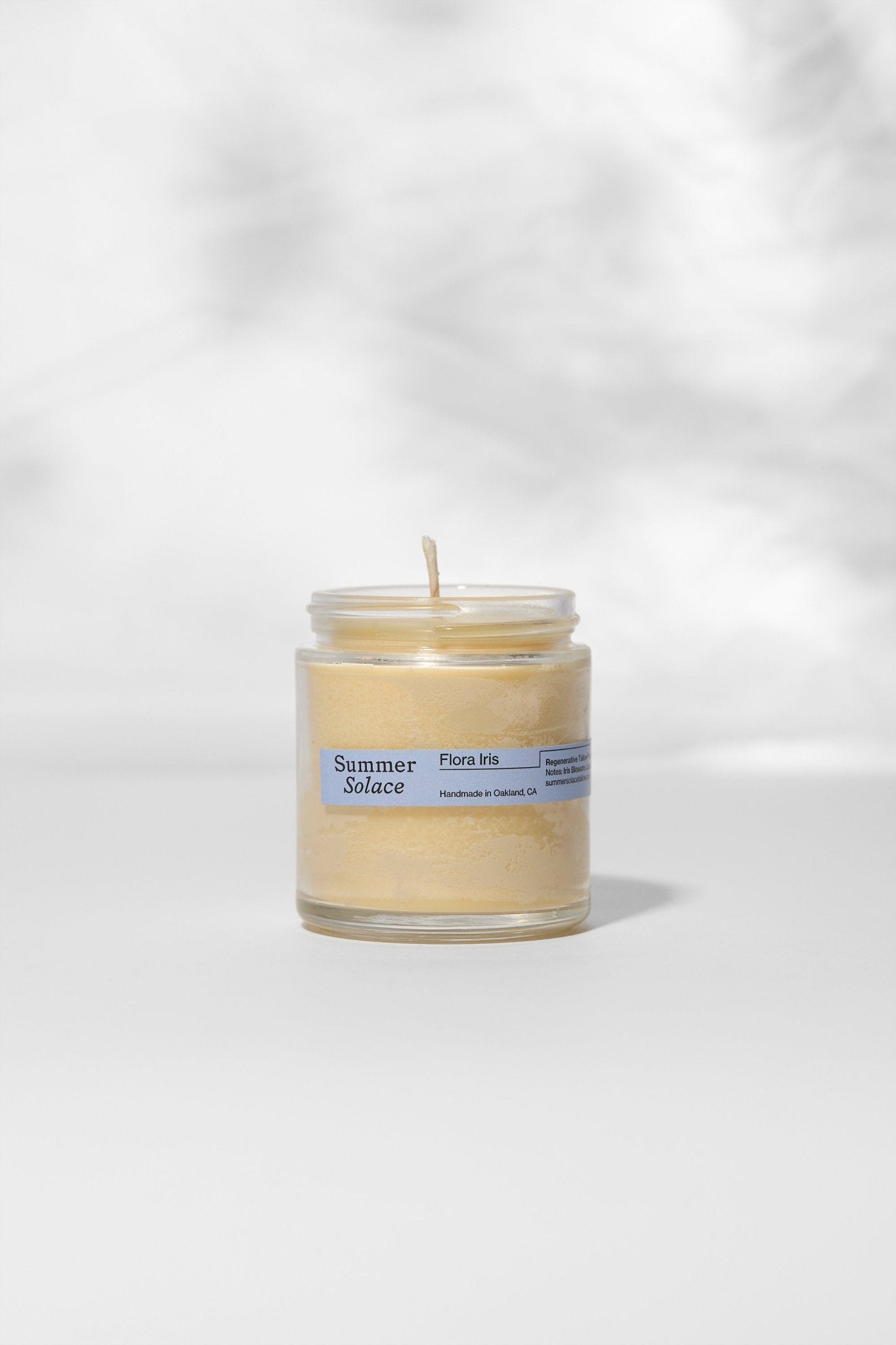 flora-iris-travel-candle-orris-root-palo-santo-9182423.jpg